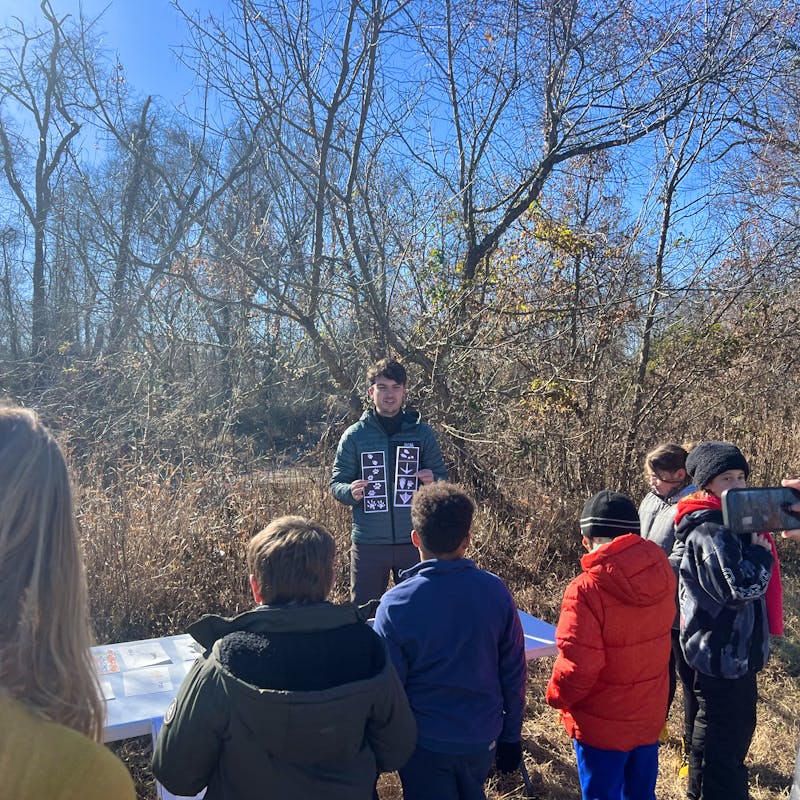 2023.11.29 - Intern Harrison Thweatt with students at Shade Your Stream event - NC - Ben Prater-DOW
